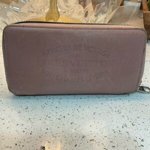 Louis Vuitton pink zippy wallet